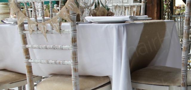 https://d1hcs5uofxldvl.cloudfront.net/chair-hire/article_additional/your-wedding-with-chair-hire10/your-wedding-with-chair-hire10-740x350.jpg - Chiavaris complementing the rustic theme.